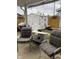 Enclosed backyard area with patio seating, featuring a storage shed at 2715 Prosperity Dr, Columbus, IN 47201