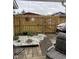 Inviting backyard features a gravel garden area, enhanced by a full privacy fence at 2715 Prosperity Dr, Columbus, IN 47201