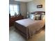 Comfortable bedroom with a well-made bed, a dresser, a window with curtains, and neutral carpeting at 2715 Prosperity Dr, Columbus, IN 47201