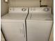 Functional laundry area featuring a washing machine and a dryer with easy-to-use controls at 2715 Prosperity Dr, Columbus, IN 47201