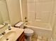 Clean bathroom featuring a vanity, toilet, and bathtub, offering essential amenities for daily use at 305 S Schroeder Rd, Muncie, IN 47304