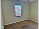 Neutral bedroom features a window allowing for lots of natural light at 305 S Schroeder Rd, Muncie, IN 47304