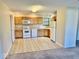 Functional kitchen featuring ample cabinet space and essential appliances for easy meal preparation at 305 S Schroeder Rd, Muncie, IN 47304