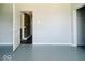 Light and airy living room featuring grey walls, white trim and white doors at 312 S Gharkey St, Muncie, IN 47305