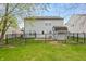 A fenced backyard with an shed provides a secure and functional outdoor space for relaxing and storage at 350 Springfield Cir, Greenwood, IN 46143