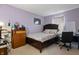Bedroom features neutral-toned walls, carpeted floors and a comfortable bed, creating a relaxing space at 350 Springfield Cir, Greenwood, IN 46143