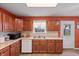 Cozy eat-in kitchen with stainless steel sink, tiled floor and bright lighting at 350 Springfield Cir, Greenwood, IN 46143