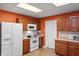 Well-lit kitchen featuring bright lighting, plentiful cabinets, and modern appliances at 350 Springfield Cir, Greenwood, IN 46143