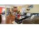 Inviting living room featuring a stone fireplace, hardwood floors, and a cozy seating arrangement at 350 Springfield Cir, Greenwood, IN 46143