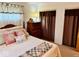 Comfortable bedroom featuring a dresser and ample closet space at 3601 N Oakwood Ave, Muncie, IN 47304