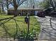 Charming single-story brick home with a well-manicured lawn and mailbox by the driveway at 3614 Thorncrest Dr, Indianapolis, IN 46234