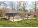 Back of the house featuring a yard, patio, and fence at 3636 E 71St St, Indianapolis, IN 46220