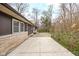 Concrete patio and landscaped yard area at 3636 E 71St St, Indianapolis, IN 46220