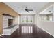 Spacious living room featuring a stone fireplace and hardwood floors at 3636 E 71St St, Indianapolis, IN 46220