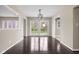 Bright living area with hardwood floors and views of the backyard at 3636 E 71St St, Indianapolis, IN 46220