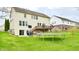 Expansive backyard with a trampoline, deck, patio, and plenty of room to play and entertain at 3724 Jonathan Rdg, Columbus, IN 47201