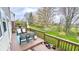 Relaxing deck with outdoor seating and a view of the lush green backyard, perfect for enjoying the outdoors at 3724 Jonathan Rdg, Columbus, IN 47201