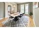 Formal dining area with hardwood floors, large windows, and plenty of seating at 3724 Jonathan Rdg, Columbus, IN 47201