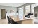 Eat-in kitchen featuring stainless steel appliances, an island, and a dining area at 3724 Jonathan Rdg, Columbus, IN 47201