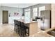 Open kitchen with granite countertops, stainless appliances, and a center island at 3724 Jonathan Rdg, Columbus, IN 47201