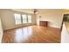 Spacious main bedroom featuring natural light, hardwood floors, and closet space at 3724 Jonathan Rdg, Columbus, IN 47201
