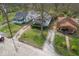 Overhead shot showing the property and surrounding neighborhood with mature trees at 3845 E 32Nd St, Indianapolis, IN 46218