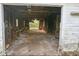 Interior view of garage, showing a rustic garage with wood framing and peeling paint at 3845 E 32Nd St, Indianapolis, IN 46218