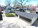 Overhead view of a home, a large two car garage, a manicured lawn and mature trees at 402 E 46Th St, Indianapolis, IN 46205