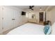 Bedroom with a ceiling fan, a closet and built-in vanity with mirror and storage at 402 E 46Th St, Indianapolis, IN 46205