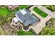 Aerial view of this secluded estate displays its landscaped grounds, walkways, and manicured hedges at 4339 Royal Pine Blvd, Indianapolis, IN 46250