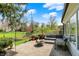 Spacious backyard patio perfect for entertaining, featuring a modern seating arrangement and a cozy fire pit at 4339 Royal Pine Blvd, Indianapolis, IN 46250