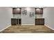Basement features updated flooring, cabinetry, wine storage, and modern design at 4339 Royal Pine Blvd, Indianapolis, IN 46250