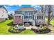 Outdoor living at its finest with a patio, fire pit, and lush landscaping at 4410 Miller Way, Westfield, IN 46062