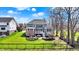 Expansive backyard featuring a patio, hot tub, lush lawn, and verdant landscaping at 4410 Miller Way, Westfield, IN 46062