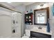 Bathroom with tiled shower, vanity with granite countertop, and stylish decor for a relaxing space at 4410 Miller Way, Westfield, IN 46062