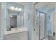 Bathroom showcasing vanity, mirror, walk-in shower, and blue walls at 4410 Miller Way, Westfield, IN 46062