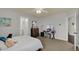 Spacious bedroom with carpet, ceiling fan, writing desk, and natural light at 4410 Miller Way, Westfield, IN 46062