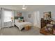 Bedroom featuring neutral walls, plush carpeting, comfortable furniture and access to en-suite bathroom at 4410 Miller Way, Westfield, IN 46062
