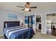 Comfortable bedroom showcasing a spacious layout and convenient en-suite bathroom access for added privacy at 4410 Miller Way, Westfield, IN 46062