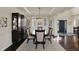 Bright dining room with a large table, chandelier, and detailed millwork at 4410 Miller Way, Westfield, IN 46062
