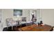Well-lit home office featuring a desk, chairs, and bright atmosphere at 4410 Miller Way, Westfield, IN 46062