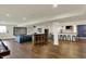 Open basement recreation room with bar area, theater, and casual seating at 4410 Miller Way, Westfield, IN 46062