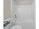 Clean bathroom with shower-tub combination and white fixtures at 45 Wisteria Way, Westfield, IN 46074