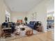 Cozy living room with hardwood floors, comfortable seating, and stylish decor at 45 Wisteria Way, Westfield, IN 46074