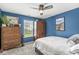 Bedroom with a ceiling fan, window, and carpet at 47 Thornburg Pkwy, Brownsburg, IN 46112