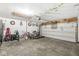 Spacious garage with ample storage and a clean, organized layout, perfect for parking and hobbies at 47 Thornburg Pkwy, Brownsburg, IN 46112