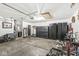 The garage features well-organized storage, including tool cabinets and a work area, enhancing functionality at 47 Thornburg Pkwy, Brownsburg, IN 46112