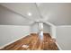 Large attic space with finished wood floors and white walls at 507 Dr Martin Luther King Jr Blvd, Anderson, IN 46016