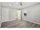 Bright bedroom features a ceiling fan, fresh paint, and a stylish en-suite bathroom at 507 Dr Martin Luther King Jr Blvd, Anderson, IN 46016