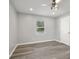 Inviting bedroom features a neutral color palette, modern flooring, and lots of natural light at 507 Dr Martin Luther King Jr Blvd, Anderson, IN 46016